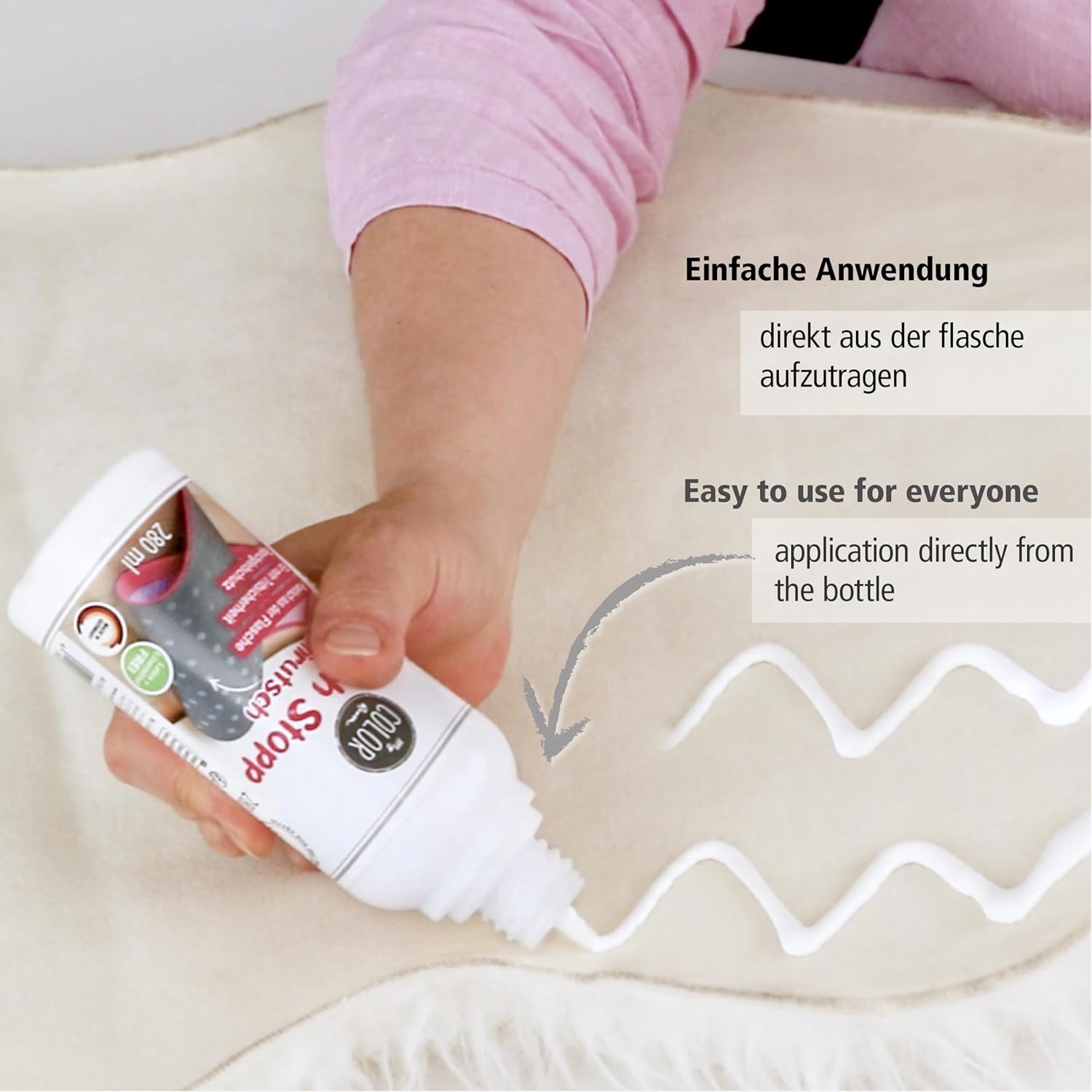 My Color Room Teppich Stopp Transparent wird direkt aus der Flasche in Wellenlinien auf die Rückseite eines Teppichs aufgetragen.