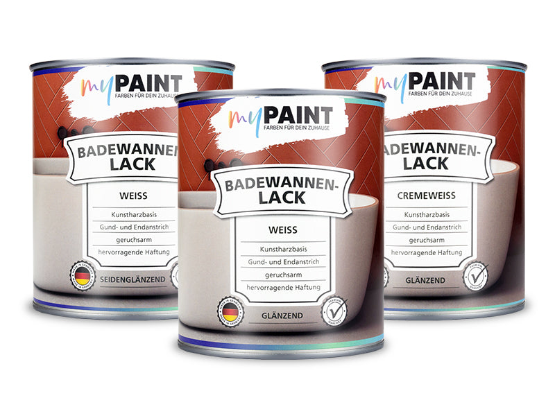 Mehrere Dosen My Paint Badewannenlack in Weiss und Cremeweiss nebeneinander
