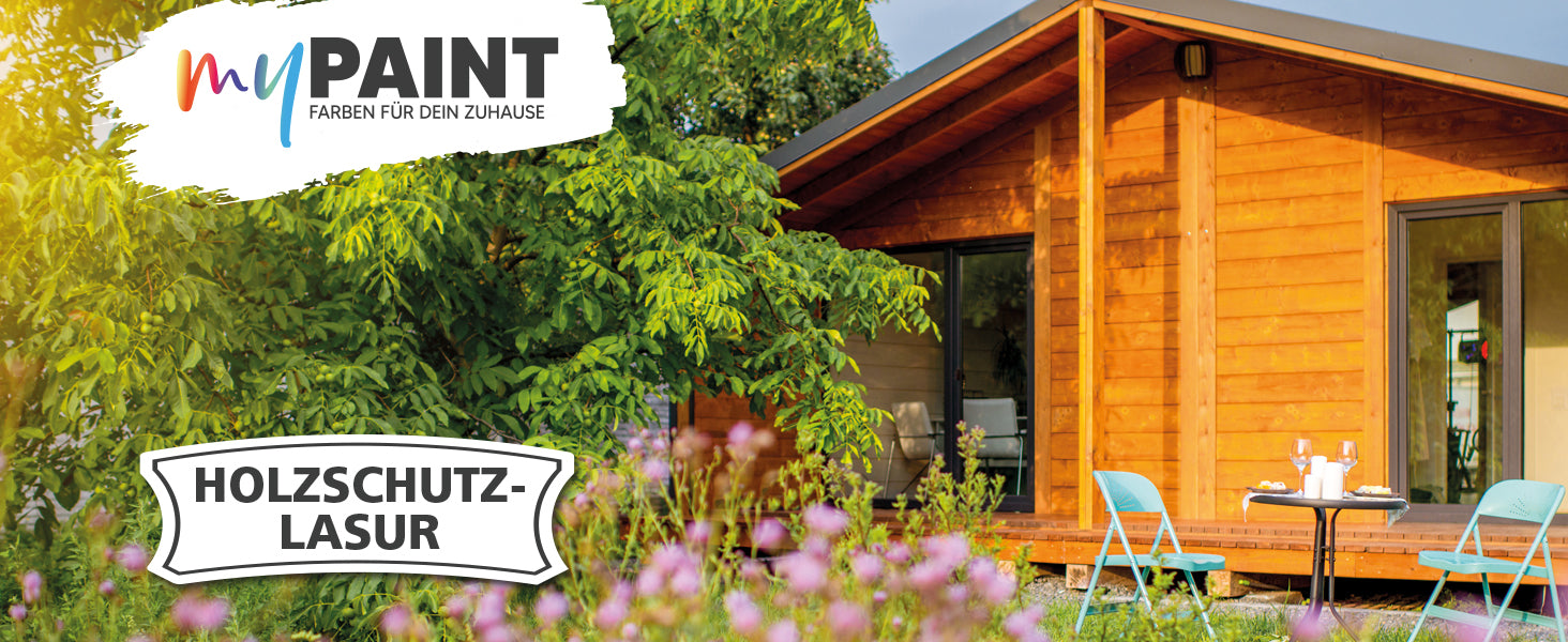 Anwendungsbild der My Paint Holzschutzlasur Außen an einem modernen Holz-Gartenhaus mit Terrasse und Sitzmöbeln im Grünen.