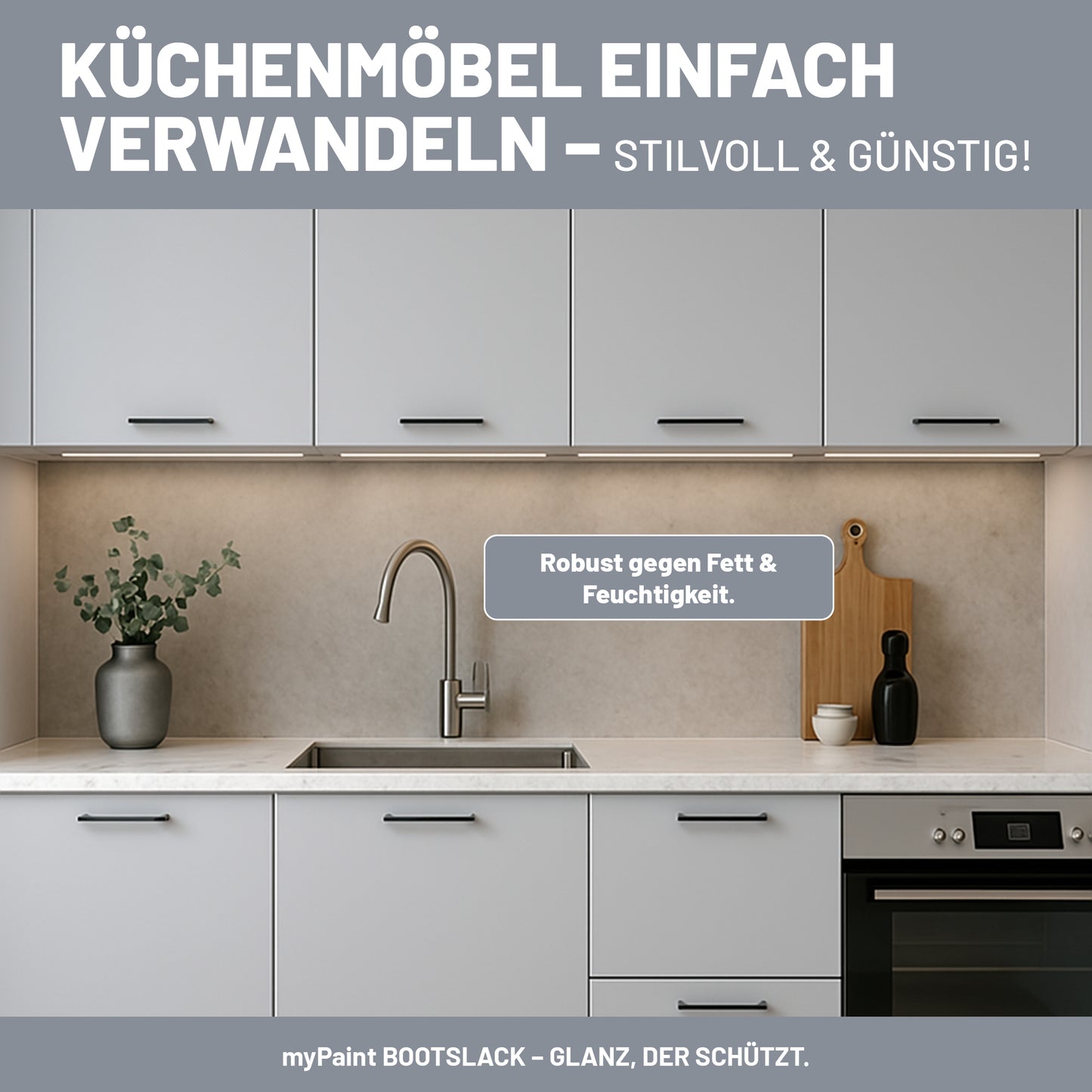 Mit My Paint Buntlack gestrichene graue Küchenmöbel mit Hinweis auf Widerstand gegen Fett und Feuchtigkeit.