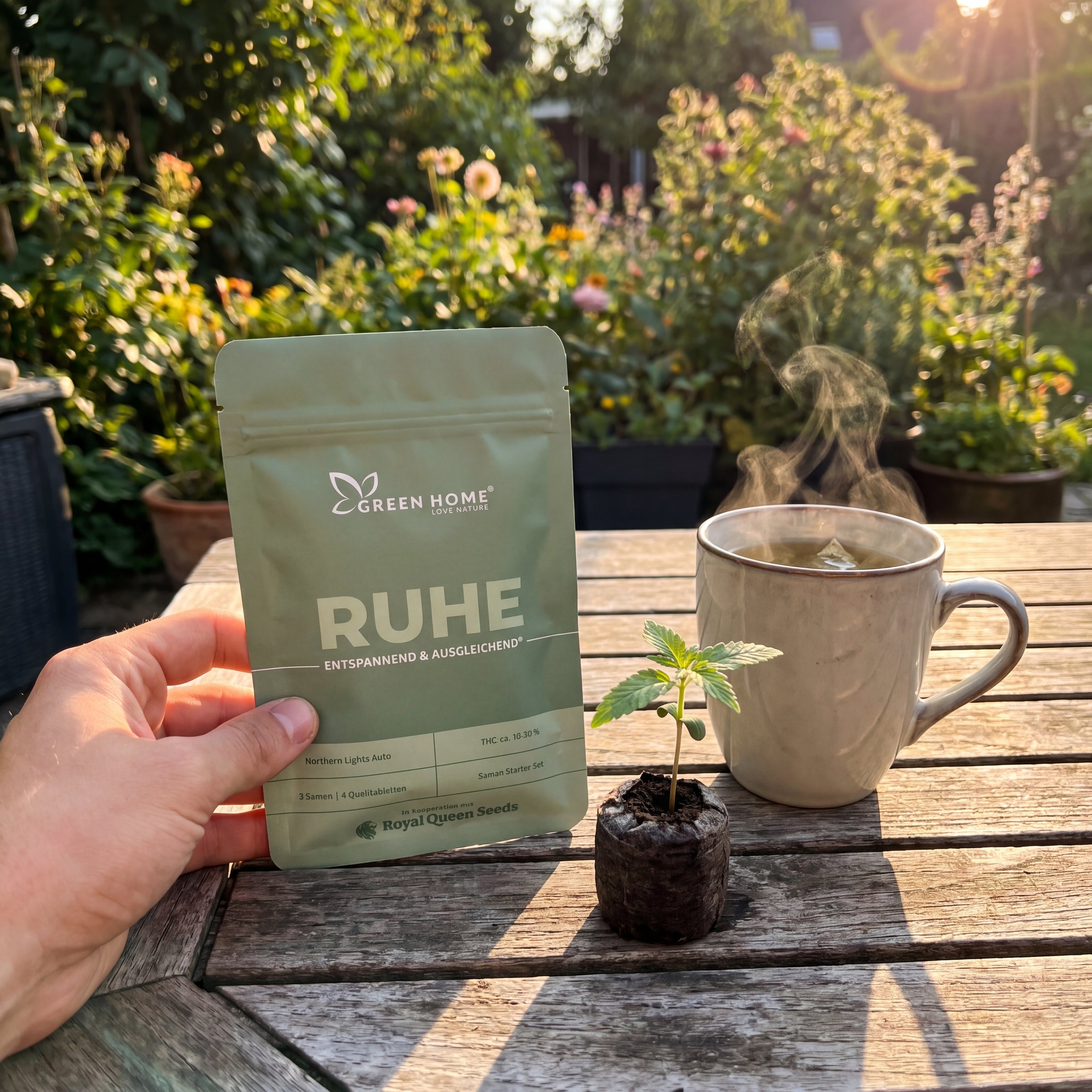 RUHE Verpackung neben Cannabis-Keimling und Tee auf Gartentisch – Kundenfoto