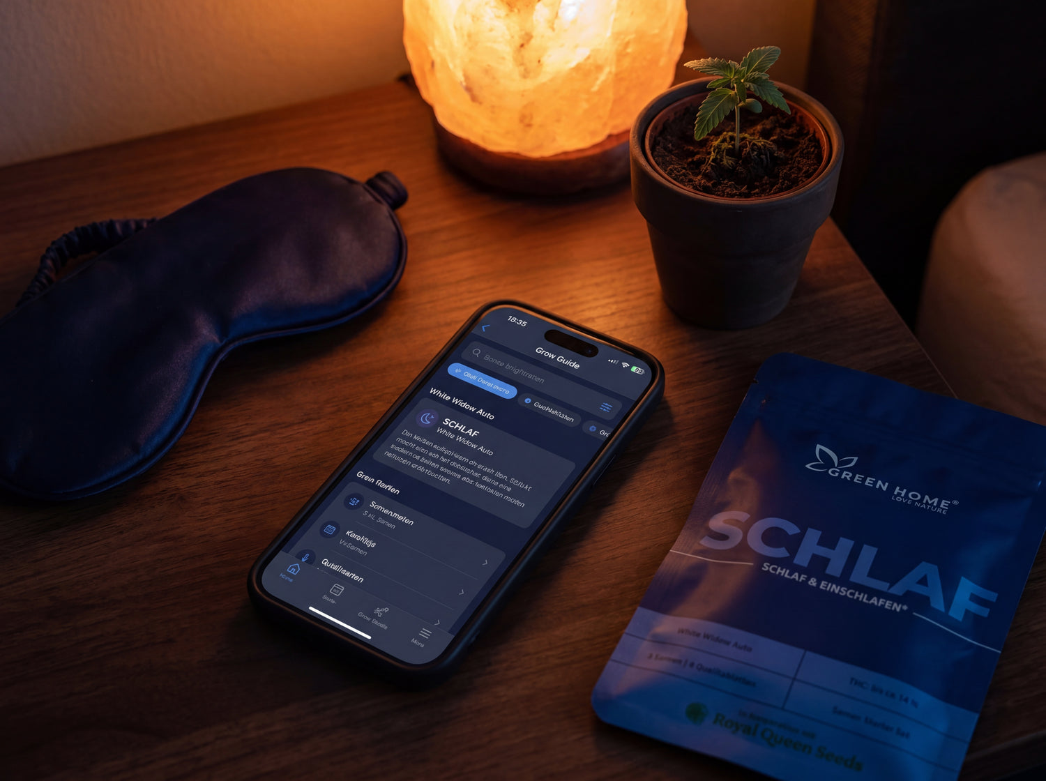 Digitaler Grow-Guide auf Smartphone bei Nacht neben SCHLAF Verpackung und Schlafmaske